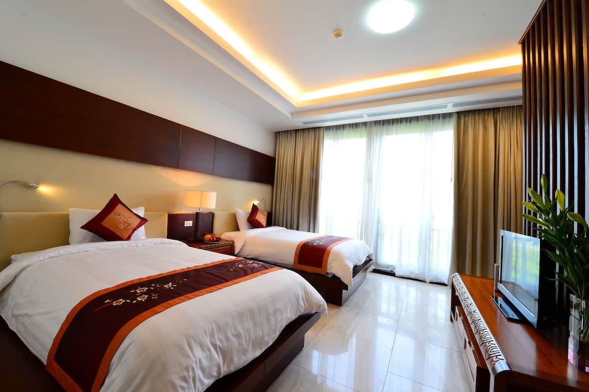 Habitación superior con 2 camas individuales | Ropa de cama de alta calidad y minibar
