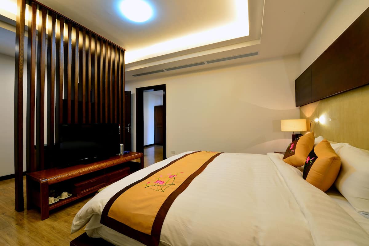 Habitación doble Deluxe | Ropa de cama de alta calidad y minibar