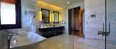 Combined shower/tub, free toiletries, hair dryer, slippers