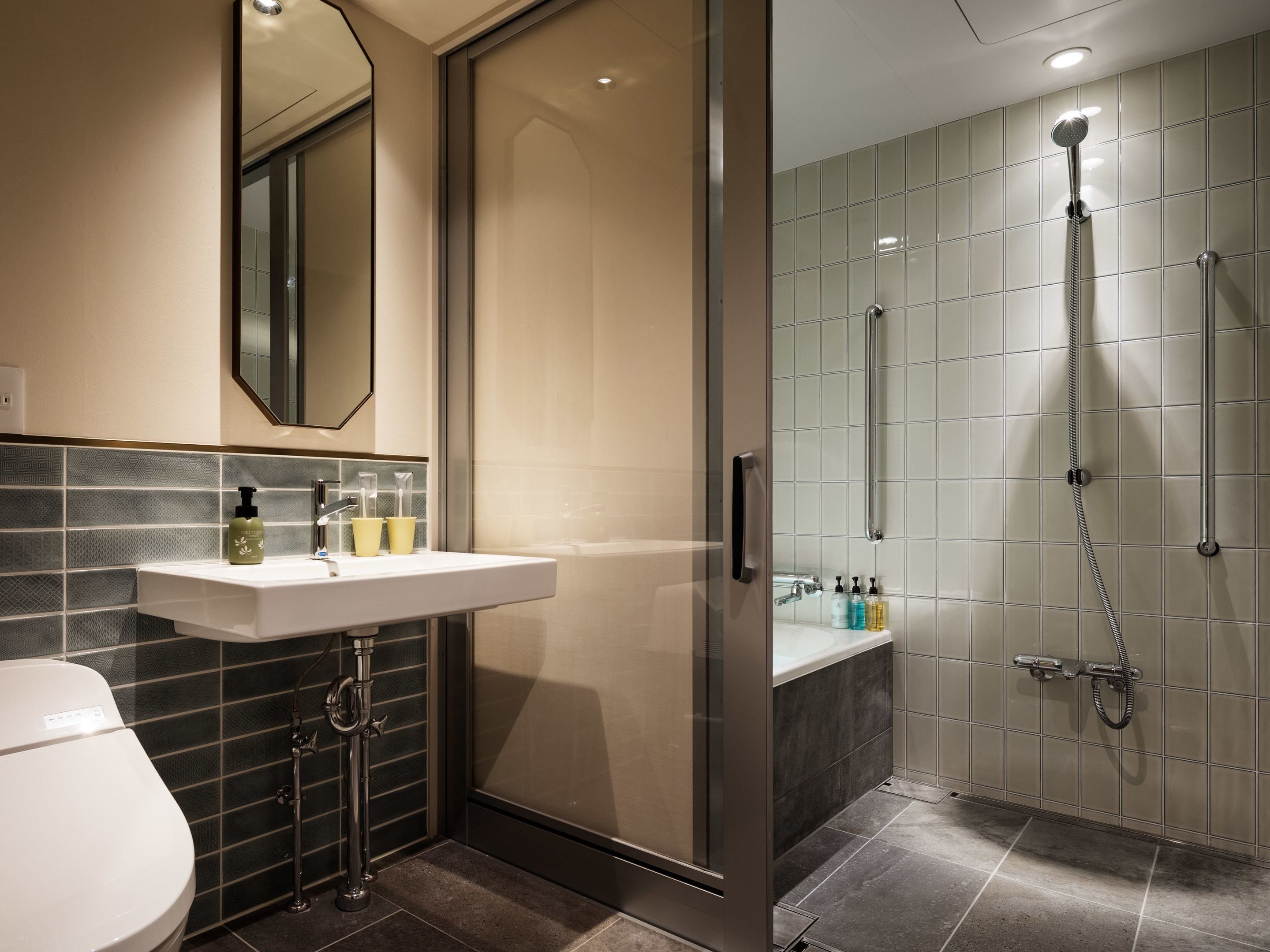 universal twin room | bathroom | free toiletries, hair dryer, slippers, electronic bidet