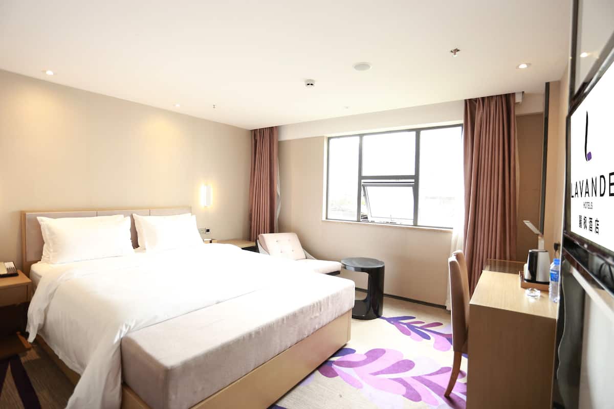 Minibar, desk, blackout curtains, iron/ironing board