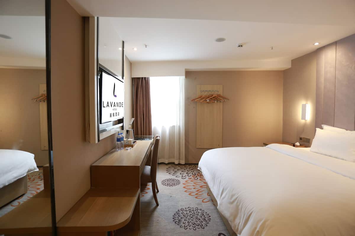 Minibar, desk, blackout curtains, iron/ironing board