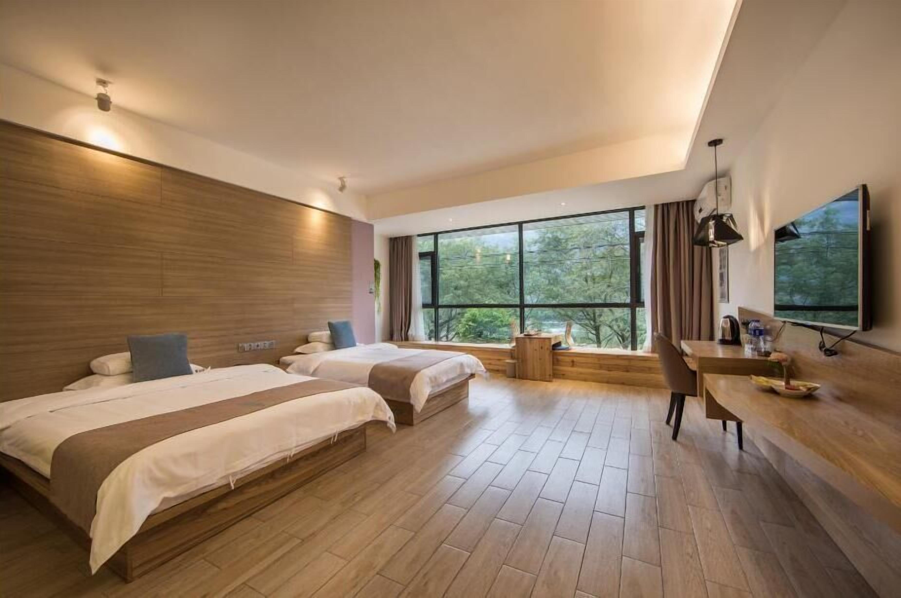 superior family room, mountain view | premium bedding, down duvets, memory-foam beds, in-room safe