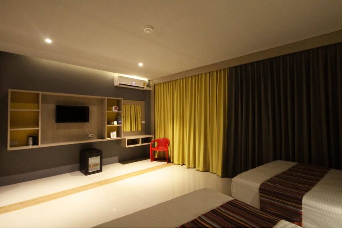 Habitación Deluxe con 2 camas individuales | Caja de seguridad en la habitación y wifi gratis