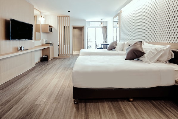 Suite Junior | Brankas, tirai kedap cahaya, Wi-Fi gratis, dan seprai linen