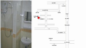 A bathroom with a shower, sink, and toilet. - BB Place (Bangkok)