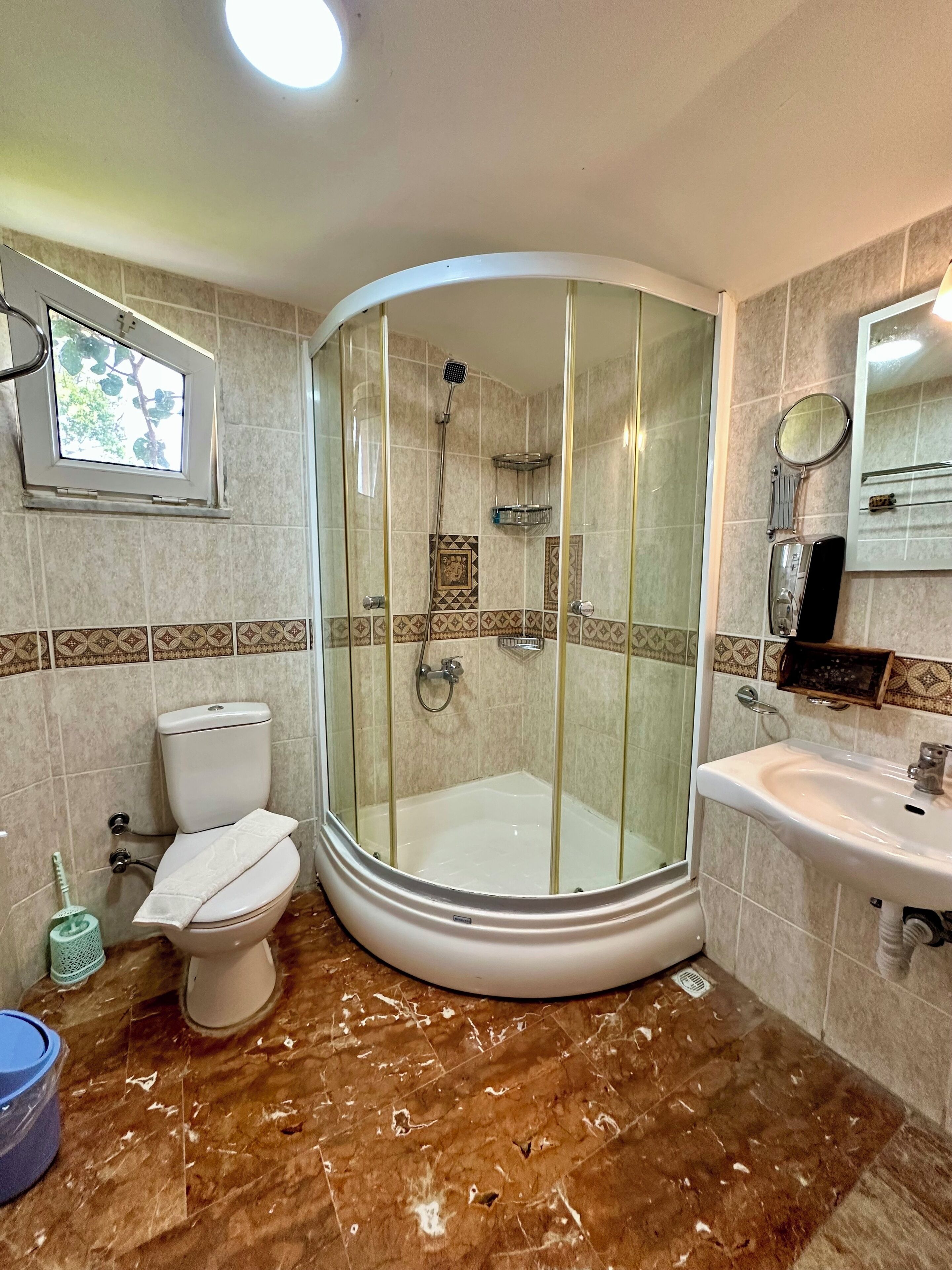 family room | bathroom | shower, free toiletries, hair dryer, slippers