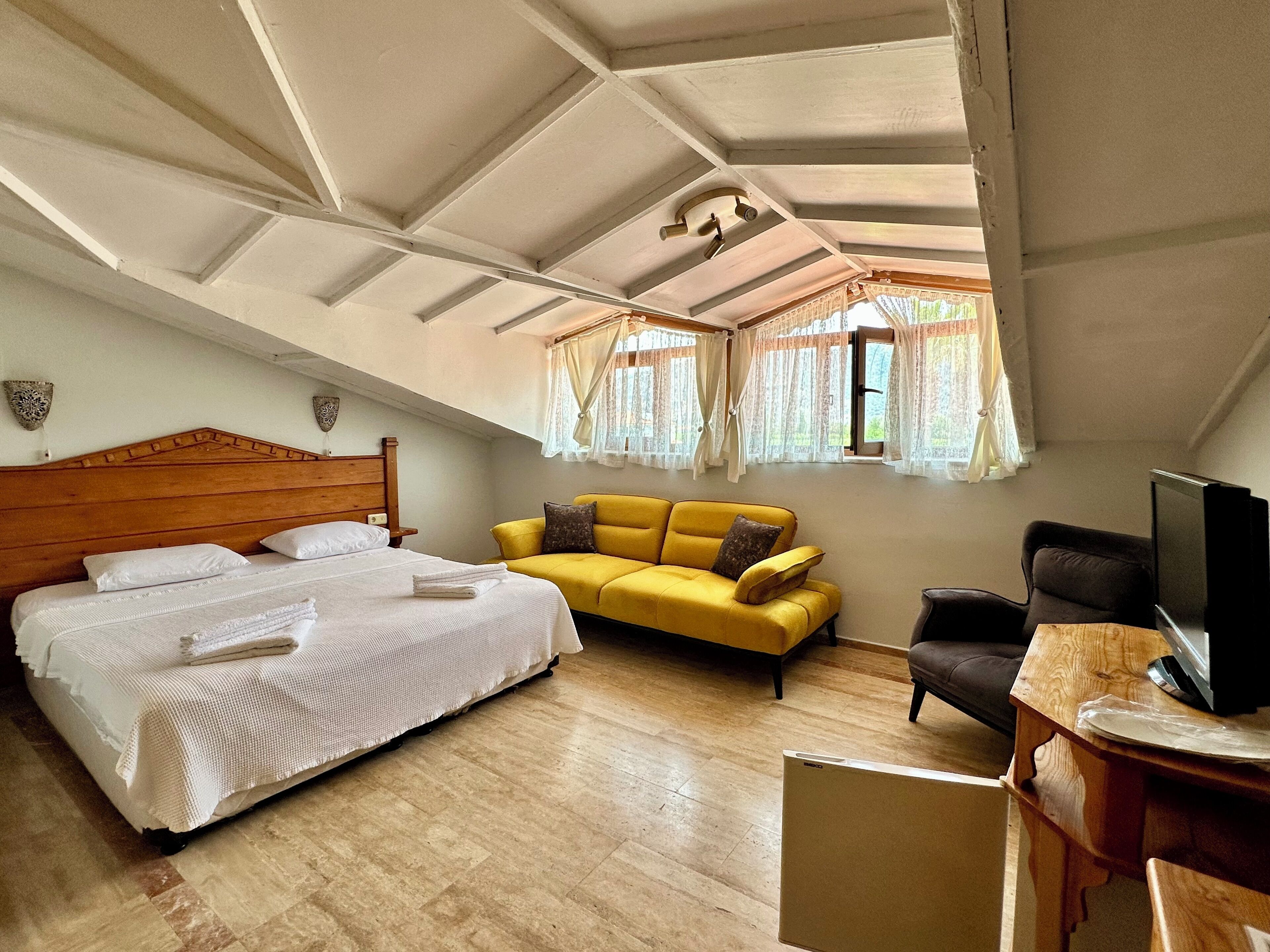 family room | premium bedding, in-room safe, individually decorated