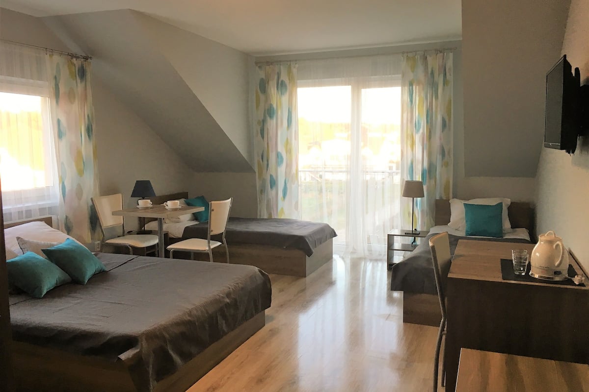 Family Quadruple Room | Desk, cribs/infant beds, rollaway beds, bed sheets