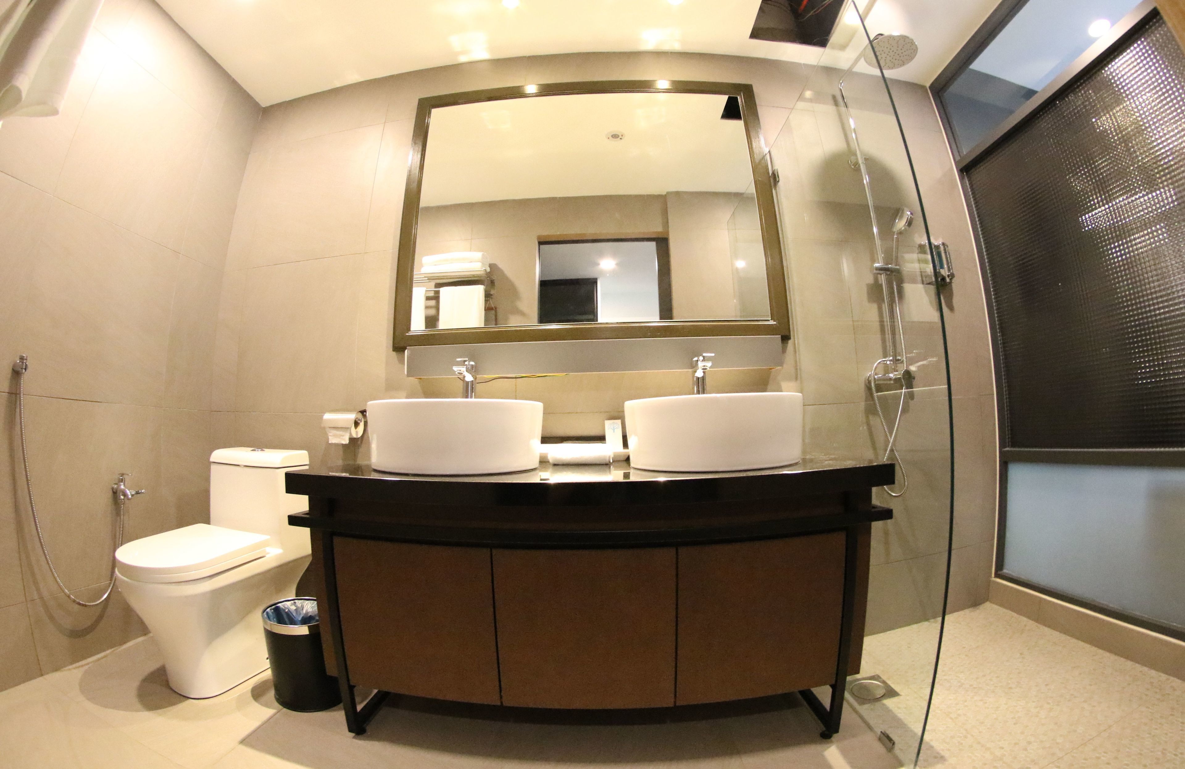 family room, multiple beds | bathroom | free toiletries, hair dryer, bathrobes, slippers