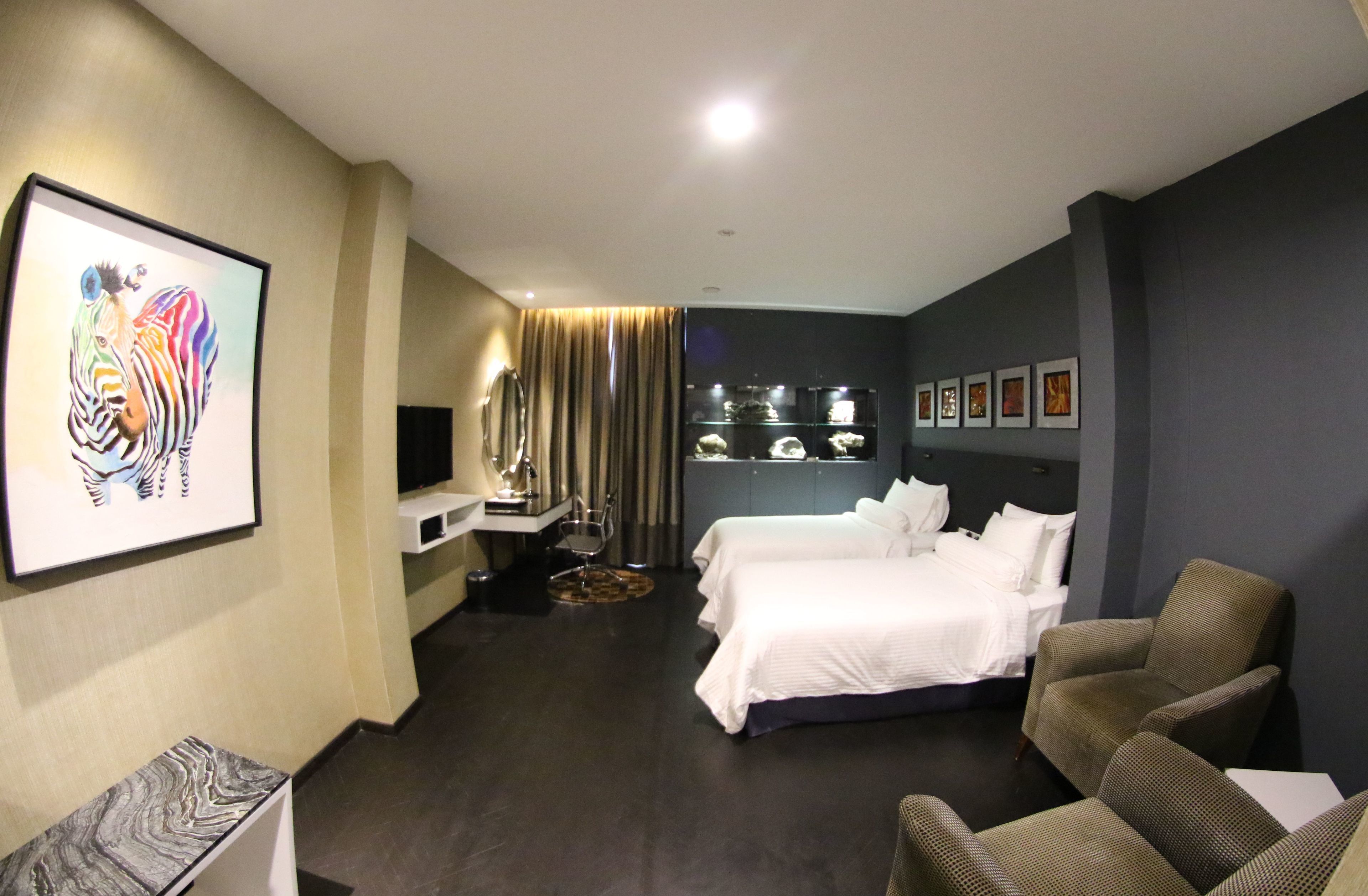 deluxe room | 1 bedroom, minibar, in-room safe, individually decorated