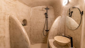 Junior Suite, Sea View (Cave) | Bathroom | Shower, free toiletries, hair dryer, bathrobes