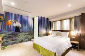 A modern hotel room with a large bed, a nightstand, a wall mural, and a window with curtains. - Rf Hotel - Sanchung (New Taipei City)