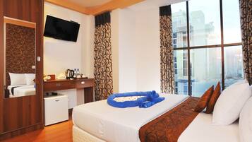 Deluxe Double/Twin Room with return airport transfers | Minibar, in-room safe, blackout drapes, iron/ironing board