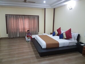 Dobbelt- eller tomannsrom – deluxe | Minibar, safe på rommet og ekstrasenger (mot et tillegg)