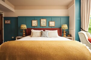 Ropa de cama de alta calidad, minibar y escritorio 