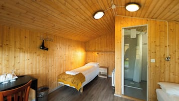 Cabaña económica | Espacio para trabajar con un portátil y sistema de insonorización