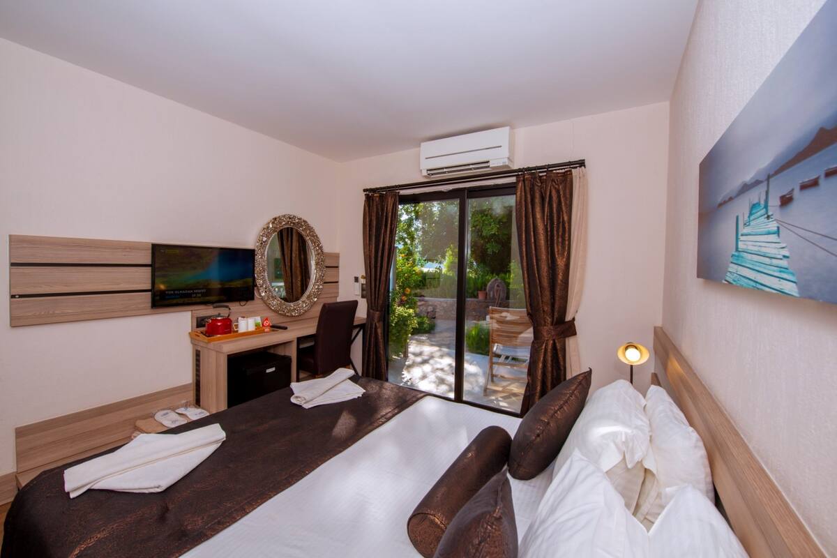 Habitación doble Deluxe, 1 cama Queen size, vista parcial al mar | Vista desde la habitación