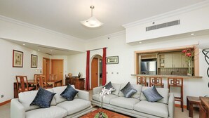 Apartment, 2 Queen Beds, Balcony | Living area - Kennedy Towers - Al Anbara (Dubai)