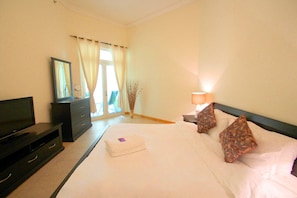 Apartment, 3 Bedrooms | 3 bedrooms, in-room safe, blackout curtains, iron/ironing board - Kennedy Towers - Al Anbara (Dubai)