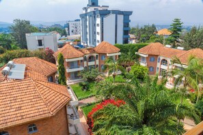 Comfort Single Room | Minibar, in-room safe, desk, blackout drapes - Hotel Chez Lando (Kigali)