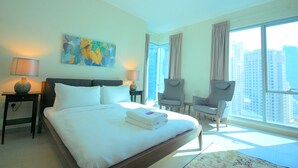 Apartment, 1 Bedroom | 1 bedroom, in-room safe, blackout curtains, iron/ironing board - Kennedy Towers - Attessa (Dubai)