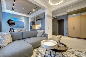 Luxury One Bedroom Apartment, Town Hall sq. View (Didzioji St. 20) | Living area | Flat-screen TV, pay films, heated floors - Vilnius Apartments & Suites - Town Hall (Vilnius)