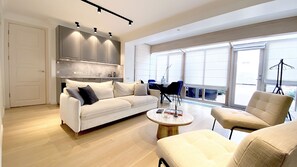 Luxury 2 Bedrooms Apartment - Gaono St. 8 | Living room | Flat-screen TV, pay movies, heated floors