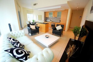 Appartement, 1 chambre | Coin séjour | Télévision