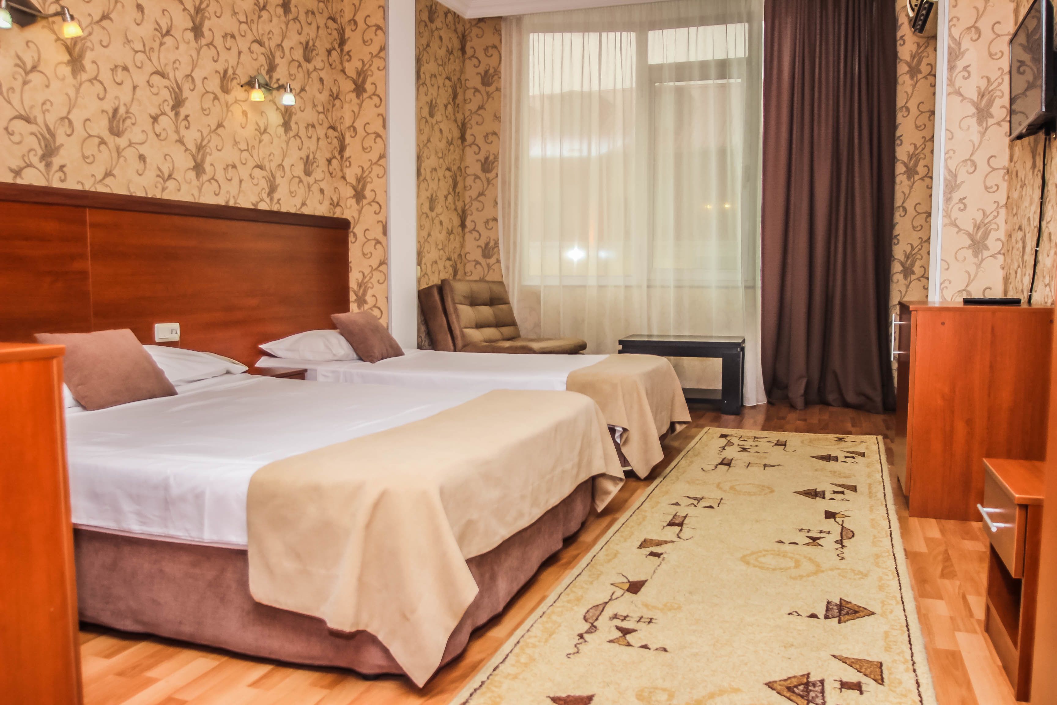 Standard Triple Room | Minibar, iron/ironing board (on request), rollaway beds (surcharge)