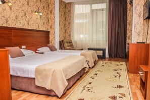 Standard Triple Room | Minibar, iron/ironing board, rollaway beds, free WiFi