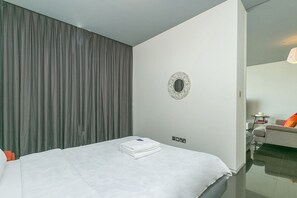 Apartment, 1 Bedroom | 1 bedroom, in-room safe, blackout curtains, iron/ironing board - Kennedy Towers - Index Tower (Dubai)