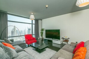Apartment, 1 Bedroom | Living room | TV - Kennedy Towers - Index Tower (Dubai)