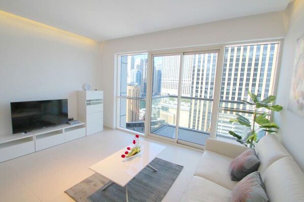 Appartement, 1 chambre | Salle de séjour | Télévision