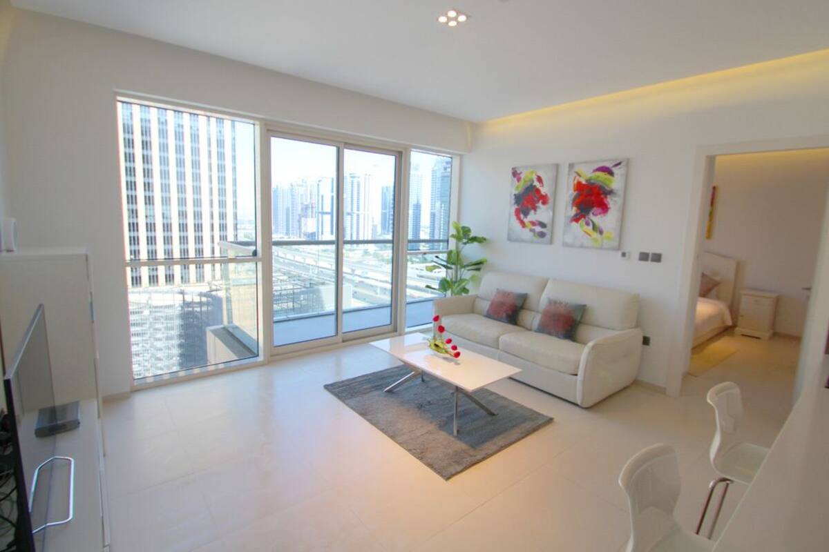 Apartamento, 1 habitación | Zona de estar | Una televisión