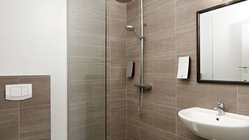 Shower, free toiletries, hair dryer, towels