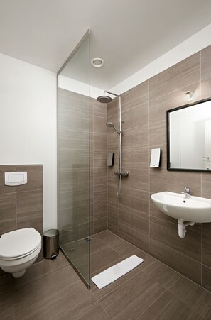 Shower, free toiletries, hair dryer, towels