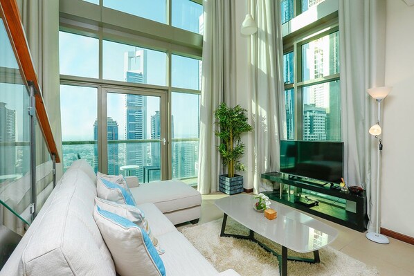 Basic Apartment, 1 Queen Bed, Pool Access | Living area | TV - E&T Holiday Homes - Liberty House (Dubai)