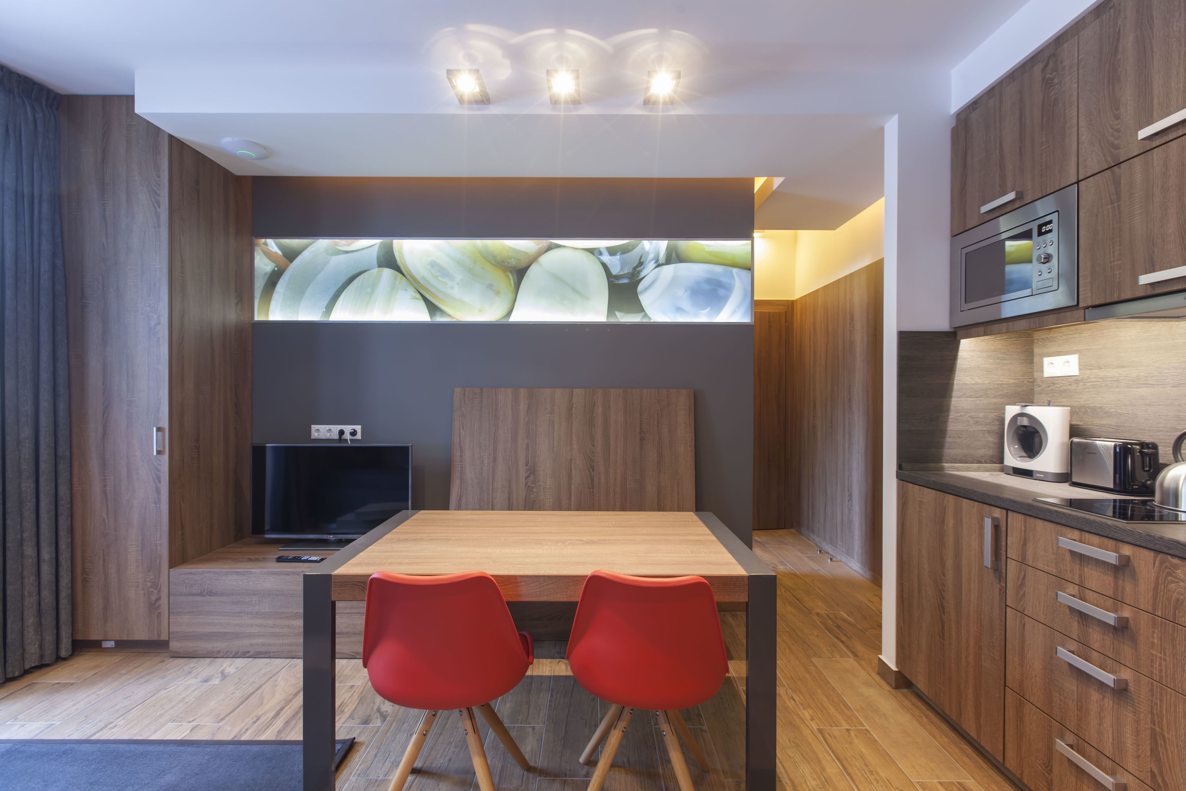 Apartment, 1 Bedroom | Living area | Flat-screen TV, DVD player, heated floors