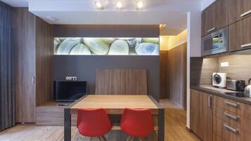 Apartment, 1 Bedroom | Living area | Flat-screen TV, DVD player, heated floors
