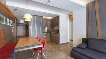 Apartment, 2 Bedrooms | Living area | Flat-screen TV, DVD player, heated floors