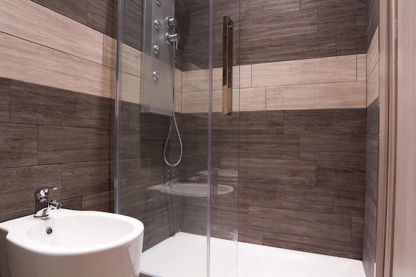 Shower, free toiletries, hair dryer, towels