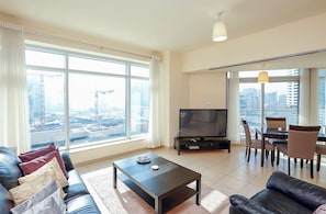Apartment, 1 Bedroom | Living area | TV