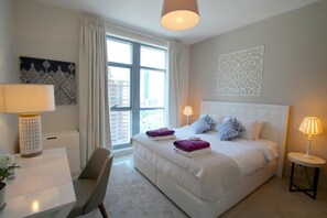 1 غرفة نوم وخزنة داخل الغرفة وستائر تعتيم ومكواة/لوح كي