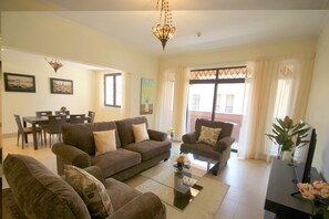 Apartment, 2 Bedrooms | Living area | TV - Kennedy Towers - Kamoon 2 (Dubai)