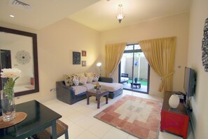 Huoneisto, 1 makuuhuone | Oleskelualue | Televisio