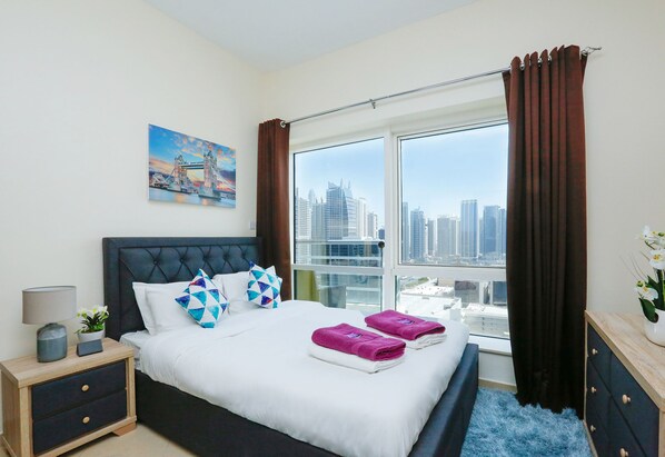 Apartment, 1 Bedroom | 1 bedroom, in-room safe, blackout drapes, iron/ironing board