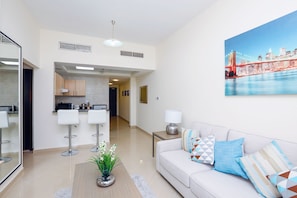 Apartment, 1 Bedroom | Living area | TV - Kennedy Towers - Concorde (Dubai)