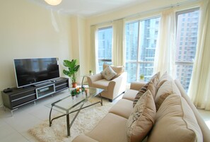 Appartement, 1 chambre | Coin séjour | Télévision à écran plat