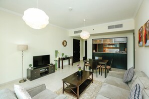 Apartment, 1 Bedroom | Living area | TV - Kennedy Towers - Al Majara (Dubai)